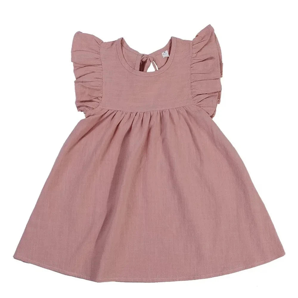 "Adorable baby doll dress in soft pastel colors, perfect for newborns and infants. This boutique-style dress features delicate ruffles, a lightweight cotton fabric for comfort, and a cute bow detail. Ideal for special occasions or everyday wear, it adds a touch of charm to any baby's wardrobe. Available in various sizes and designed for easy dressing. Shop now at Raising Rayne Boutique for stylish, high-quality baby clothes."