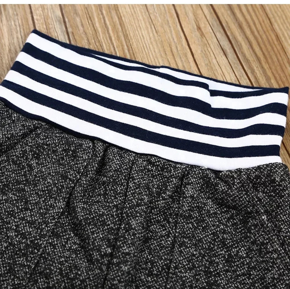 Close-up of the elastic waistband on the Boys’ Black & White Striped Jogging Suit, highlighting adjustable fit and comfort for active boys.”