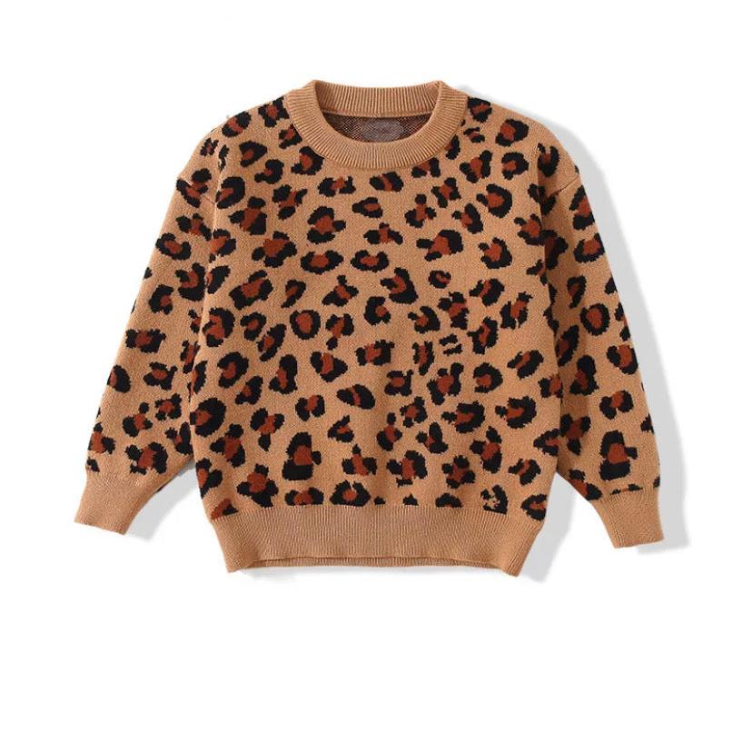 “Girls’ Cheetah Print Crew Neck Sweater – a stylish and cozy addition to your little girl’s wardrobe. Featuring a vibrant cheetah print, this high-quality, soft sweater is perfect for school, playdates, or casual outings. Available in multiple sizes, it’s designed to provide comfort with a fashionable touch.”