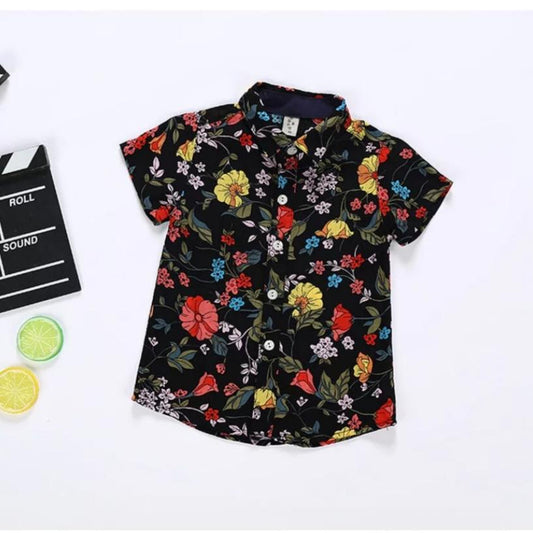 Front view of a stylish children’s shirt from Raising Rayne Boutique, showcasing vibrant design and high-quality craftsmanship.