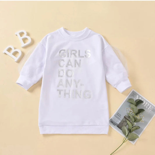 “Front view of the Girls Can Do Anything Sweater, featuring a bold ‘Girls Can Do Anything’ slogan across the front. This ultra-soft, high-quality sweater combines style and comfort, perfect for empowering little girls. Available in multiple sizes, it pairs well with jeans, skirts, or leggings for any occasion.”