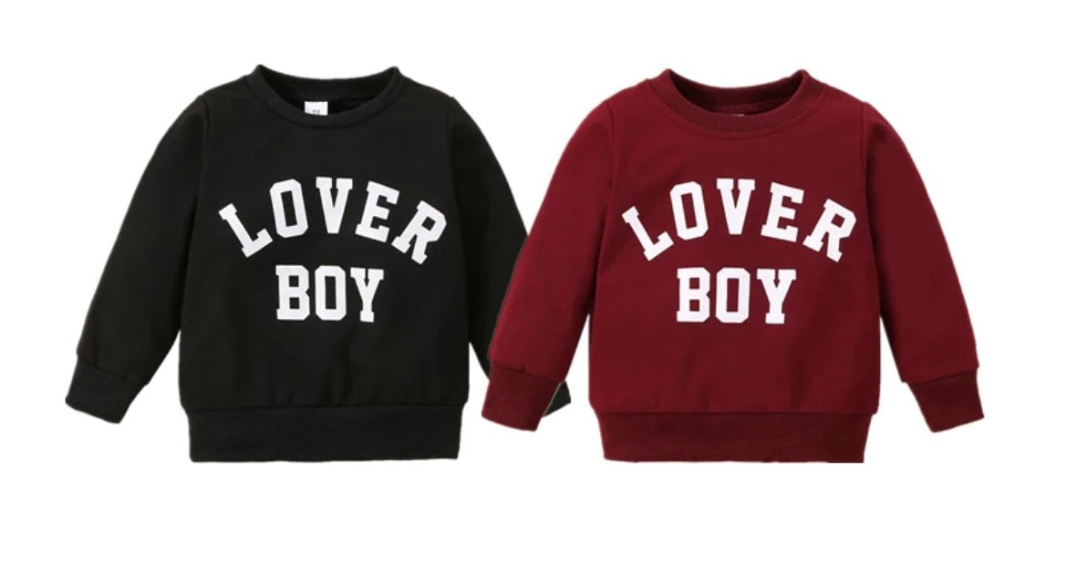 “Front view of the Kids’ Boy Crew Neck Sweater featuring ‘Lover Boy’ in bold letters across the chest. Made from soft, high-quality fabric, this stylish sweater offers warmth and comfort for boys, perfect for casual outings or playdates.”