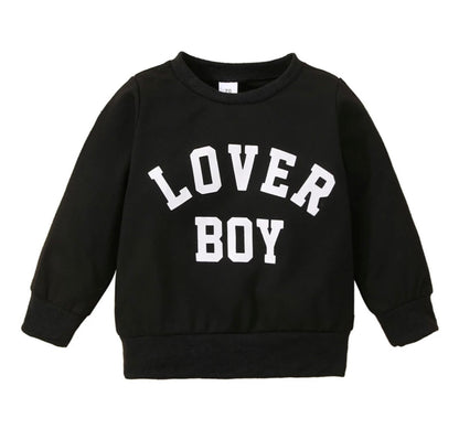 “Front view of the Kids’ Boy Crew Neck Sweater featuring ‘Lover Boy’ in bold letters across the chest. Made from soft, high-quality fabric, this stylish sweater offers warmth and comfort for boys, perfect for casual outings or playdates.”