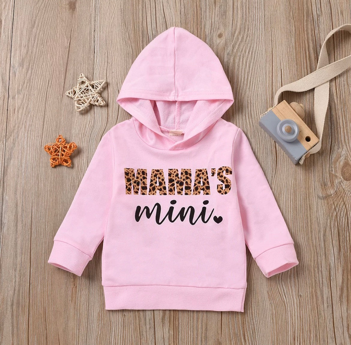 Cozy and stylish hoodie featuring a playful copy-and-paste face design, perfect for matching mom and daughter outfits.