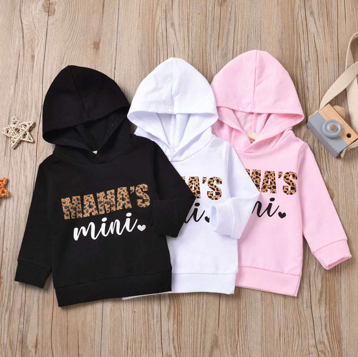 Cozy and stylish hoodie featuring a playful copy-and-paste face design, perfect for matching mom and daughter outfits.