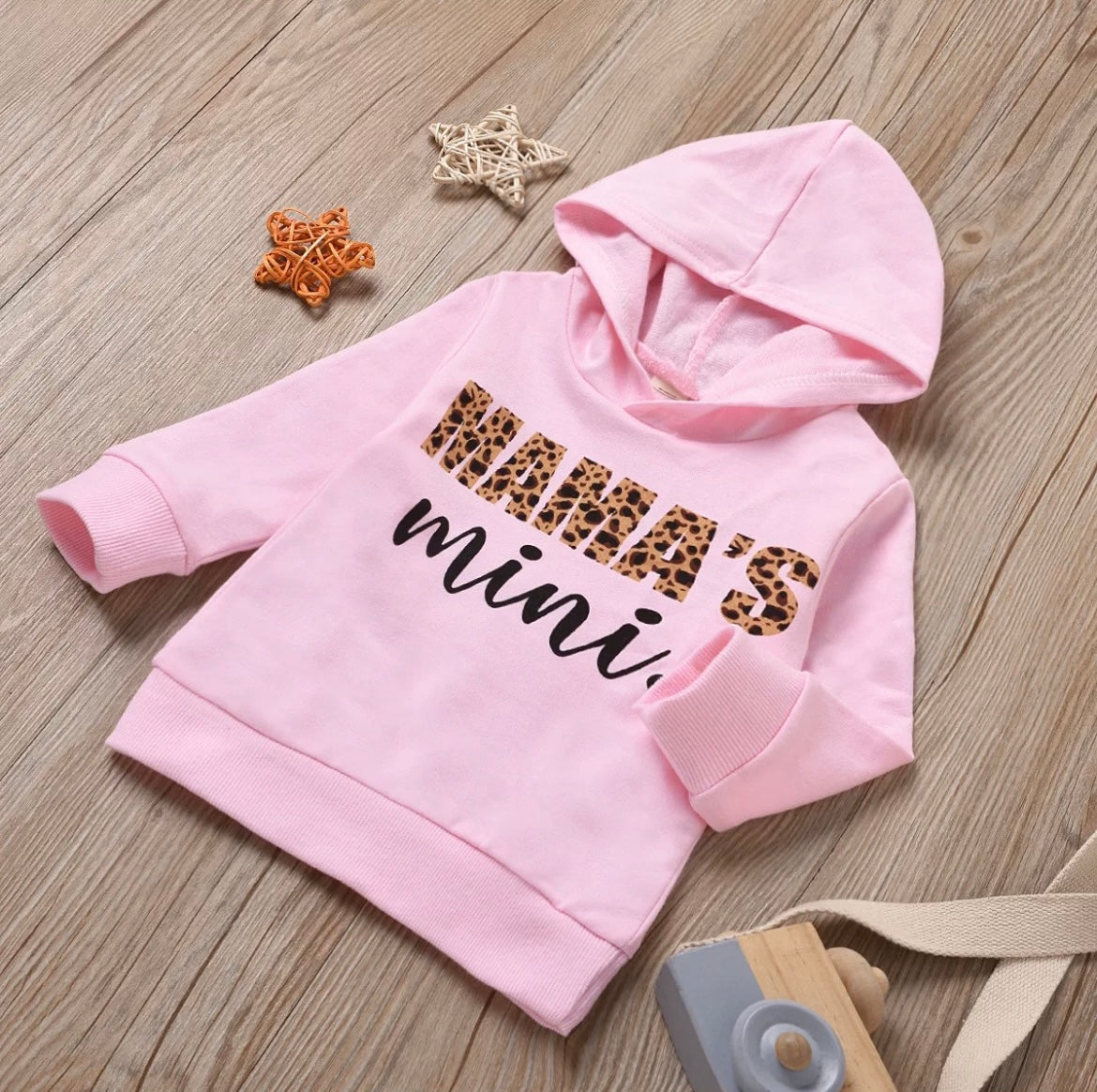 Cozy and stylish hoodie featuring a playful copy-and-paste face design, perfect for matching mom and daughter outfits.