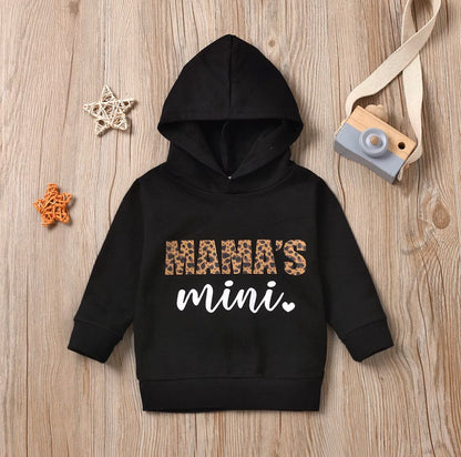 Cozy and stylish hoodie featuring a playful copy-and-paste face design, perfect for matching mom and daughter outfits.