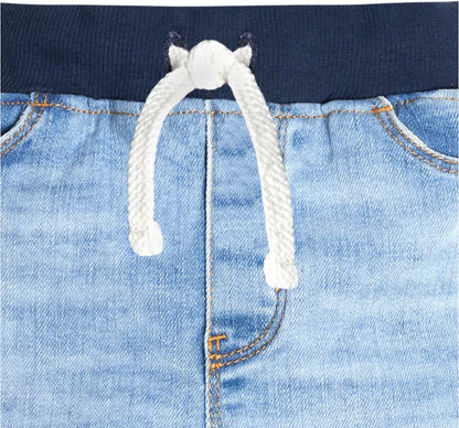 Unisex toddler Light blue jeans with elastic drawstring waistband, durable denim, and classic dark blue wash, perfect for boys and girls ages 1-4 years old.