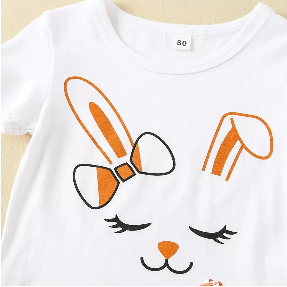 Close-up of girls’ bunny face t-shirt. Soft cotton fabric with a cute bunny print, adding a playful touch to her wardrobe. Comfortable and easy to wear, perfect for warm days.”